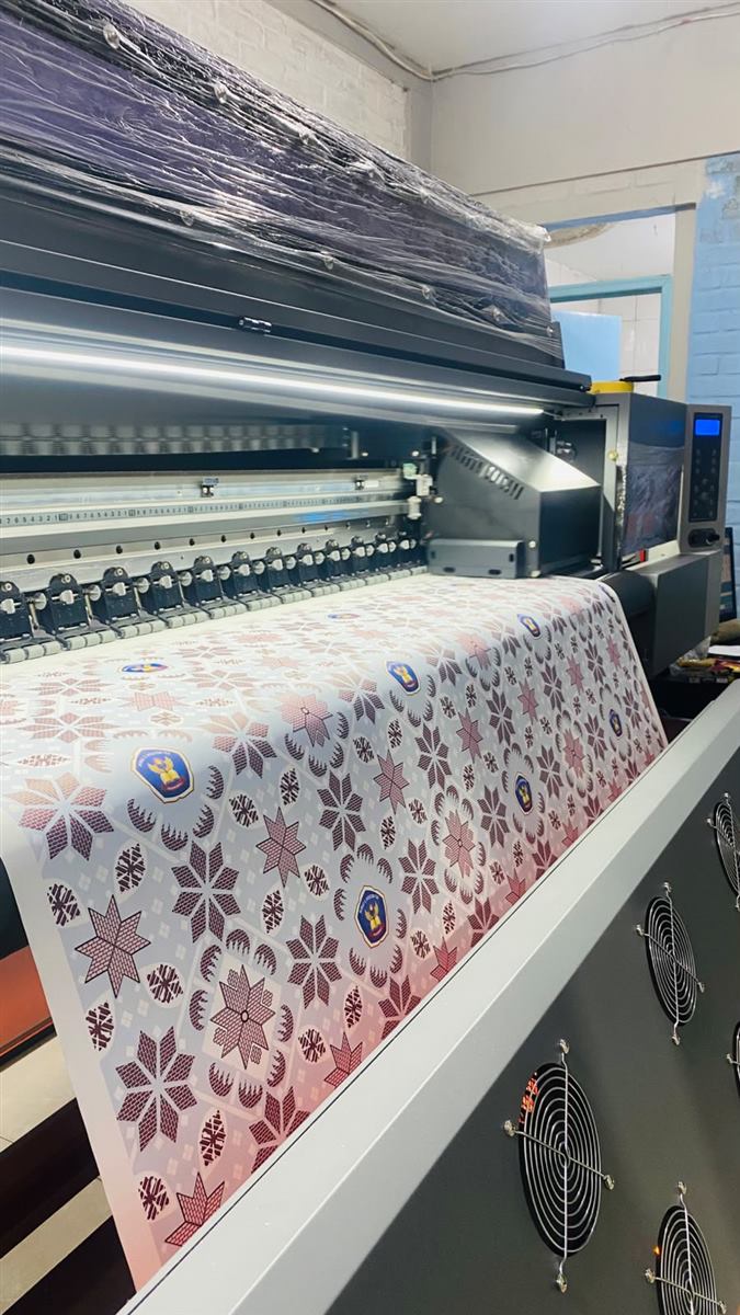 Mesin printer sublime untuk cetak kain dan jersey custom di workshop Sublime Print Bandung Barat